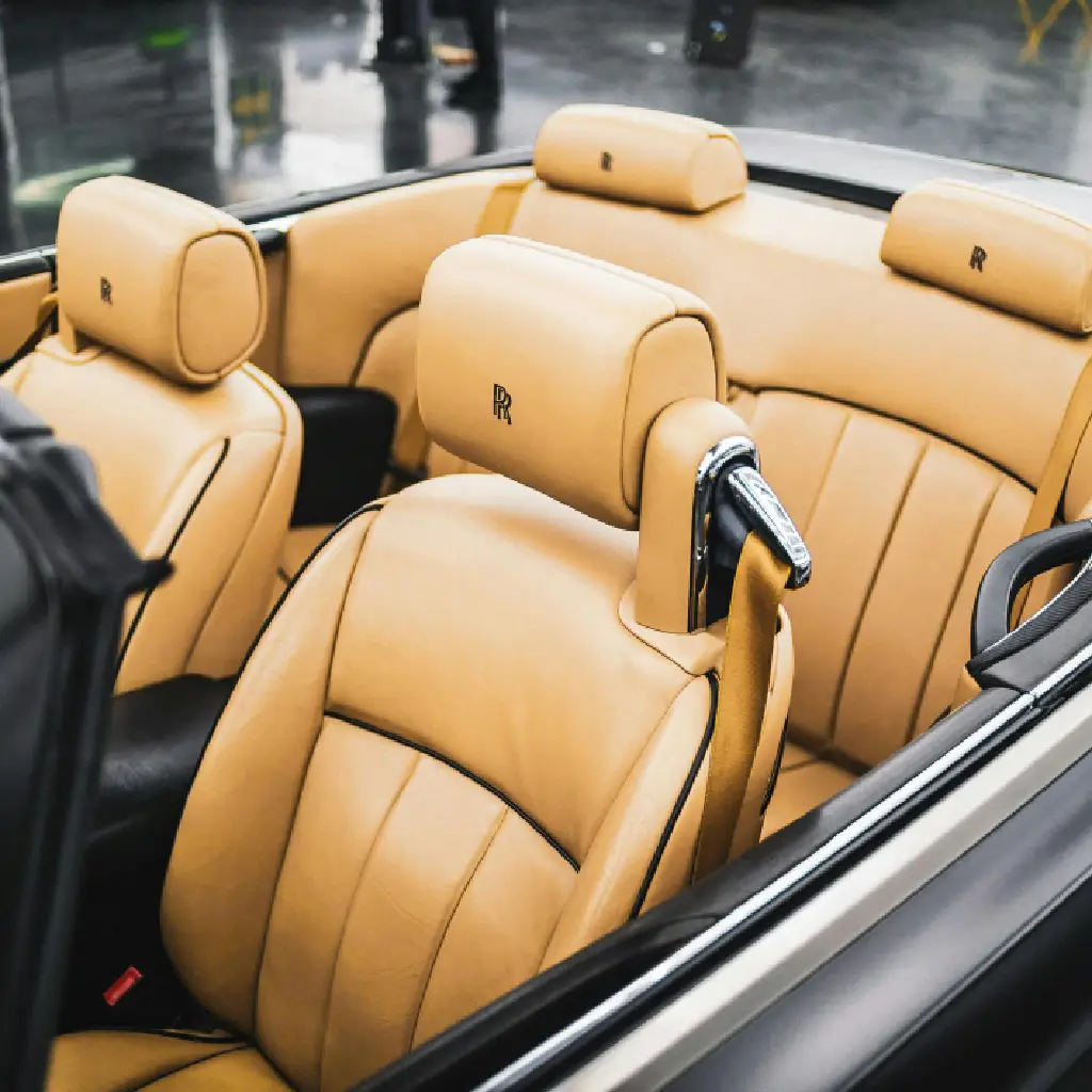 Blackfeather luxury custom leather car interior with premium beige seat covers and upholstery detailing
